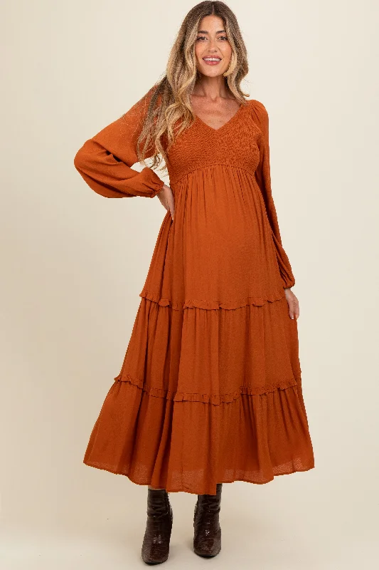 Overstock trendy dressCamel Smocked Tiered Maternity Midi Dress